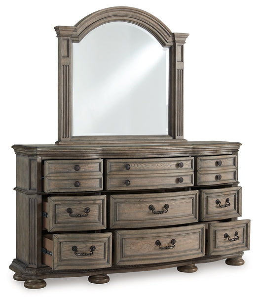 Ardenfield King Upholstered Sleigh Bed with Mirrored Dresser and Chest