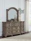 Ardenfield California King Upholstered Sleigh Bed with Mirrored Dresser and Chest