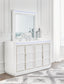 Chalanna King Upholstered Storage Bed with Mirrored Dresser