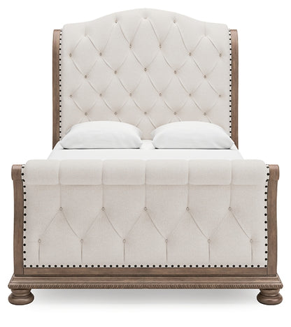 Ardenfield Queen Upholstered Sleigh Bed with Mirrored Dresser