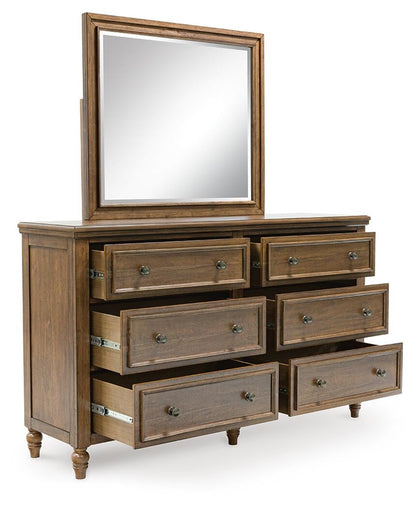 Sturlayne California King Upholstered Panel Bed, Dresser, Mirror, Chest and Nightstand