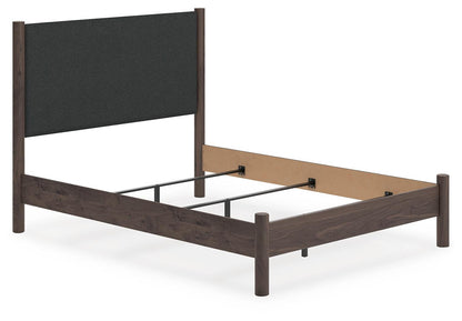 Pamytta Queen Upholstered Panel Bed, Dresser, Mirror and Nightstand