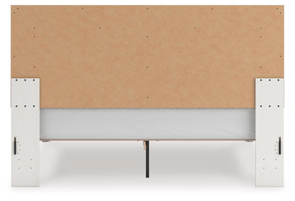 Zuraleus King Upholstered Panel Platform Bed, Dresser, Mirror and Nightstand