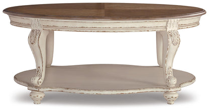 Realyn Oval Cocktail Table